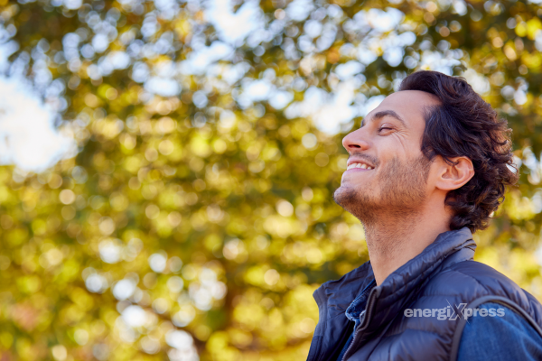 Healthy man enjoying the outdoors, balanced lifestyle