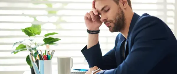 Tired man, low energy, unmotivated expression